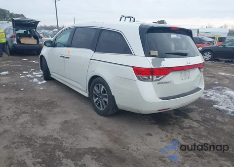 2014 Honda Odyssey Touring/Touring Elite z USA, uszkodzony, nr VIN 5FNRL5H92EB018703